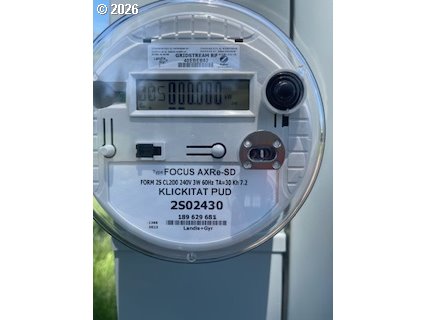 124 Woodland Road Goldendale, WA 98620 - Photo 27 of 27 a view of a hallway with washer and dryer