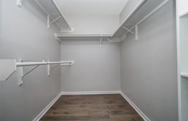 a view of an empty walk in closet