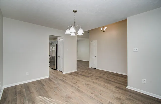 a view of a chandelier in a room