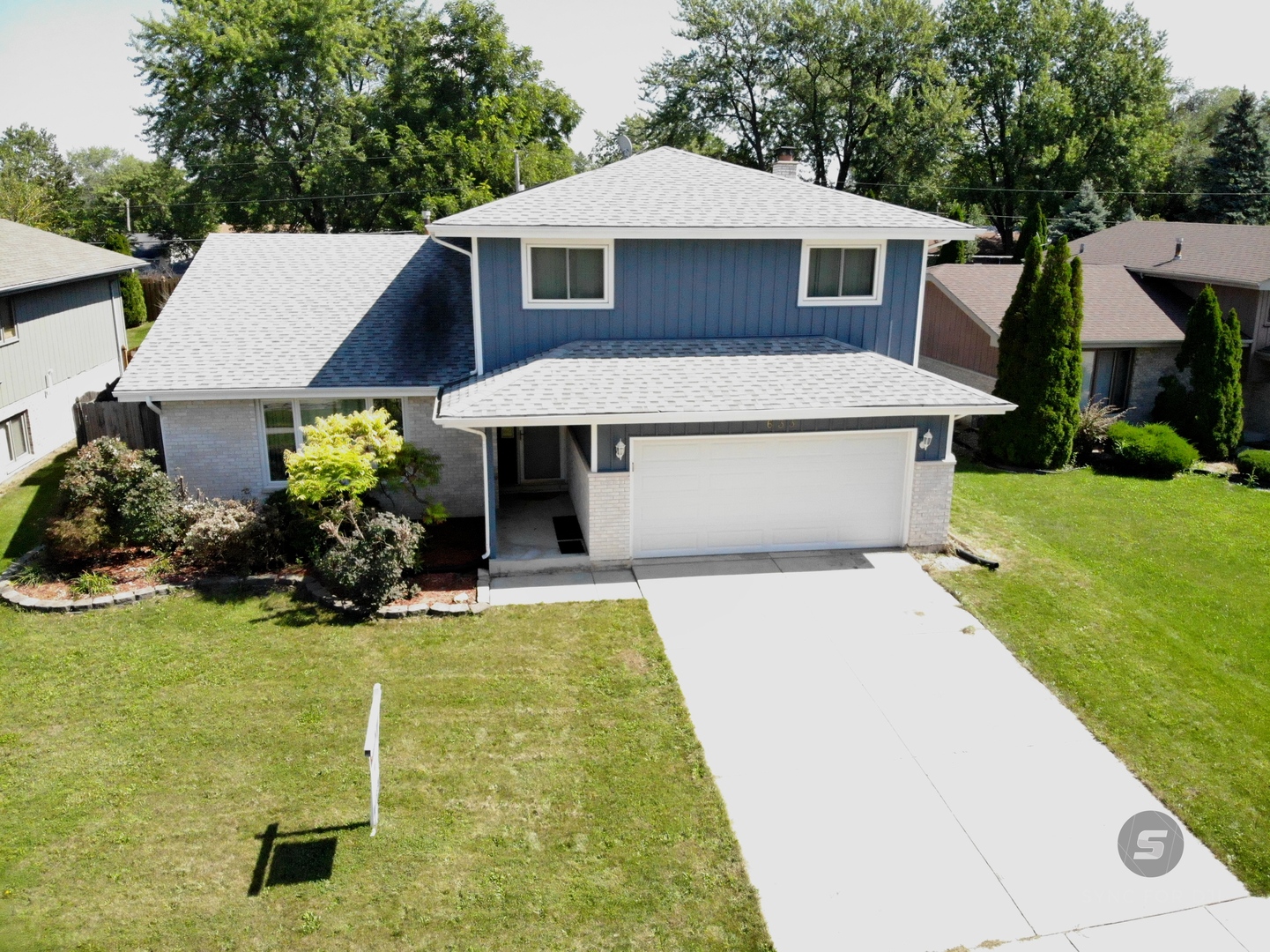 633 Gavin Avenue Romeoville, IL 60446 - Photo 1 of 33 a front view of a house with a yard garage and outdoor seating