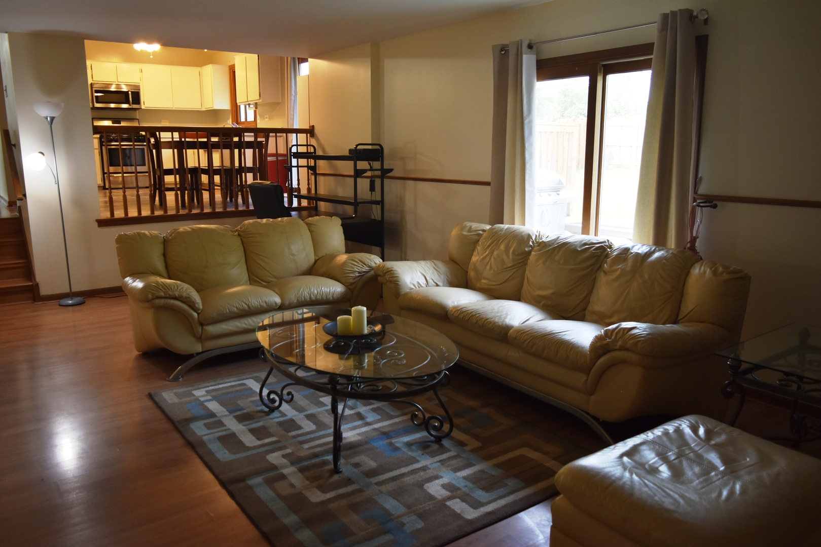 633 Gavin Avenue Romeoville, IL 60446 - Photo 12 of 33 a living room with furniture and a table