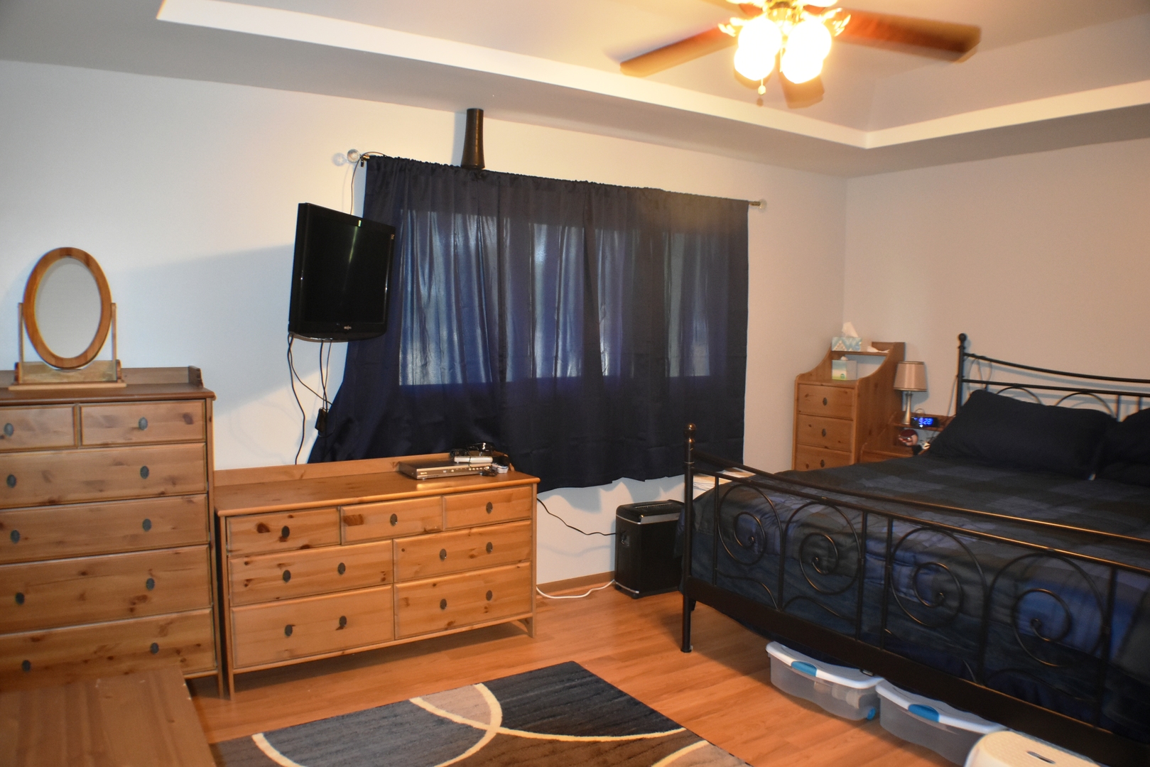 633 Gavin Avenue Romeoville, IL 60446 - Photo 16 of 33 a bedroom with a bed and a dresser