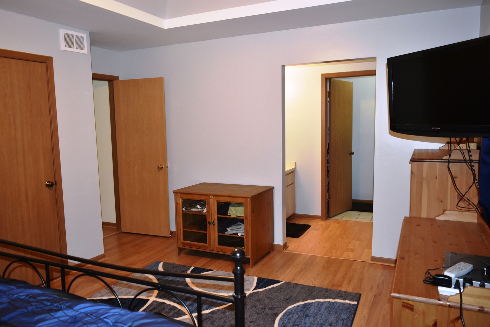 633 Gavin Avenue Romeoville, IL 60446 - Photo 17 of 33 a living room with furniture and a flat screen tv
