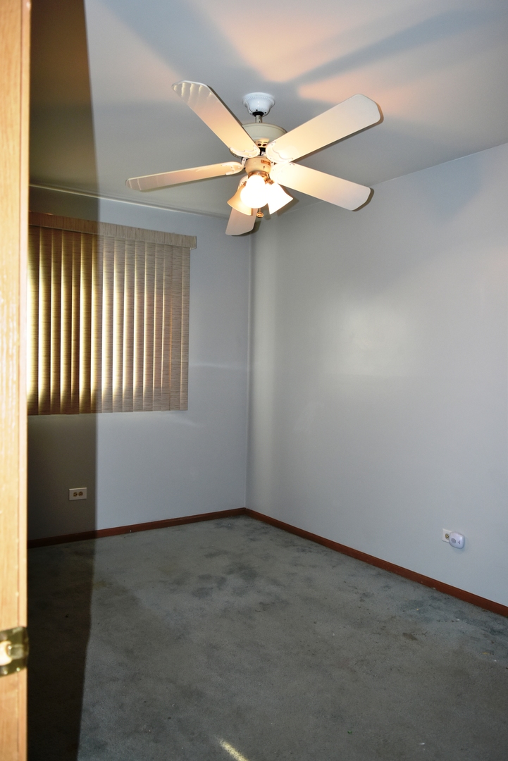 633 Gavin Avenue Romeoville, IL 60446 - Photo 22 of 33 a view of an empty room with a window