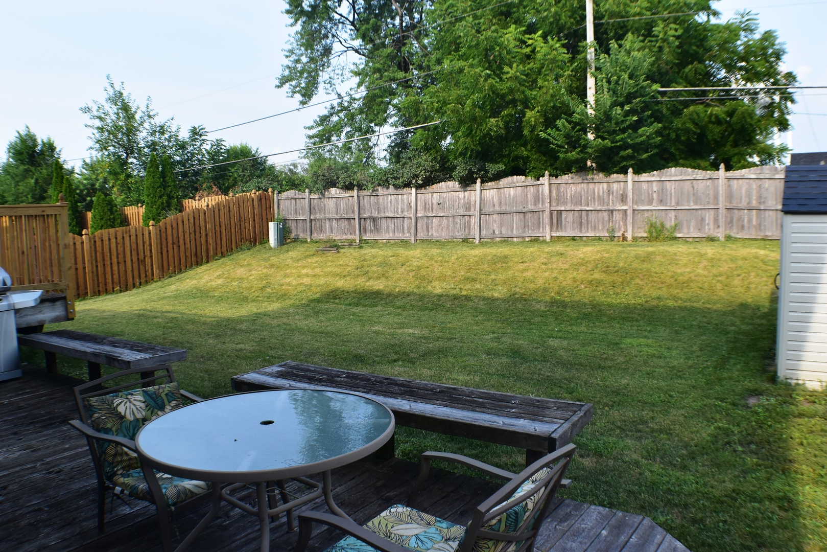633 Gavin Avenue Romeoville, IL 60446 - Photo 29 of 33 a backyard of a house with table and chairs