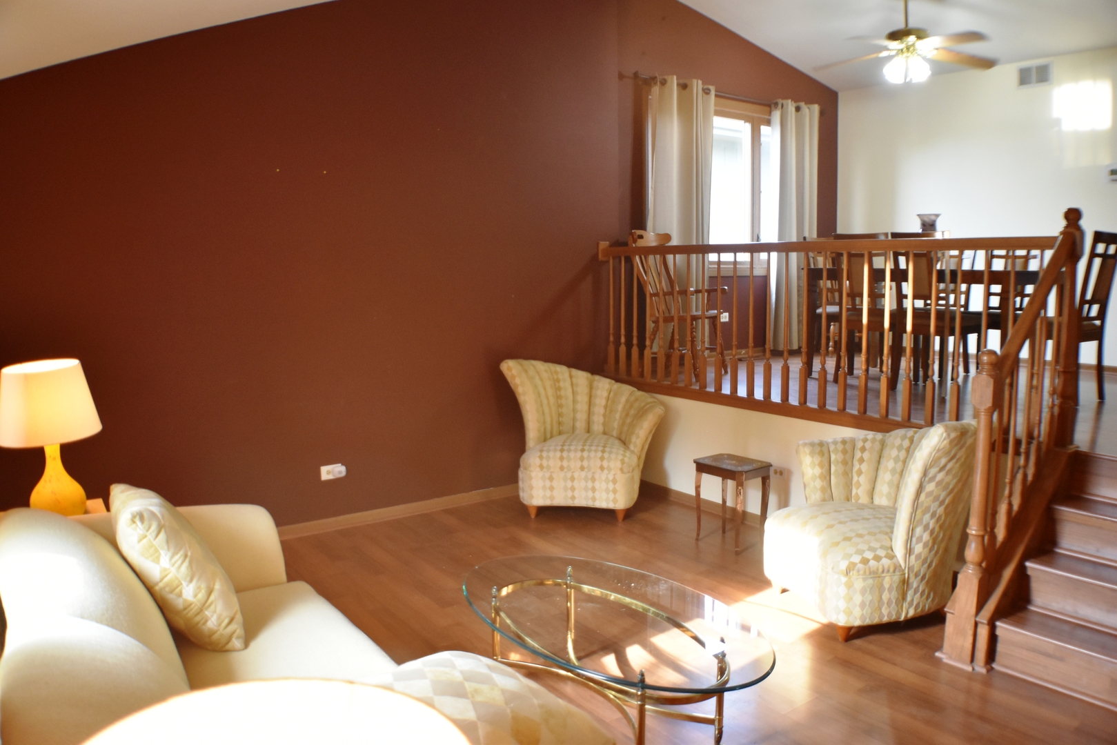 633 Gavin Avenue Romeoville, IL 60446 - Photo 4 of 33 a living room with furniture and a lamp