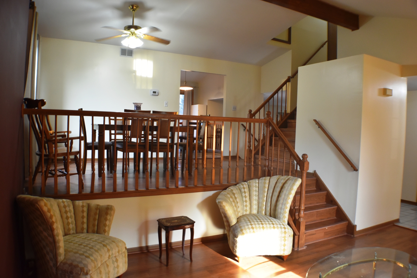 633 Gavin Avenue Romeoville, IL 60446 - Photo 5 of 33 a view of a dining room with furniture wooden floor and chandelier