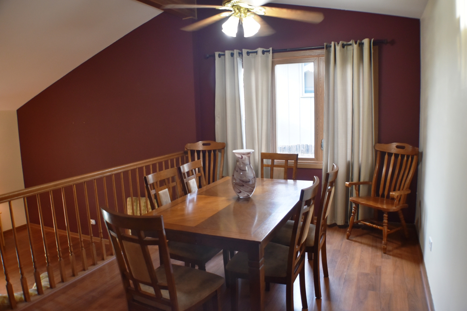 633 Gavin Avenue Romeoville, IL 60446 - Photo 8 of 33 a view of a dining room with furniture and window