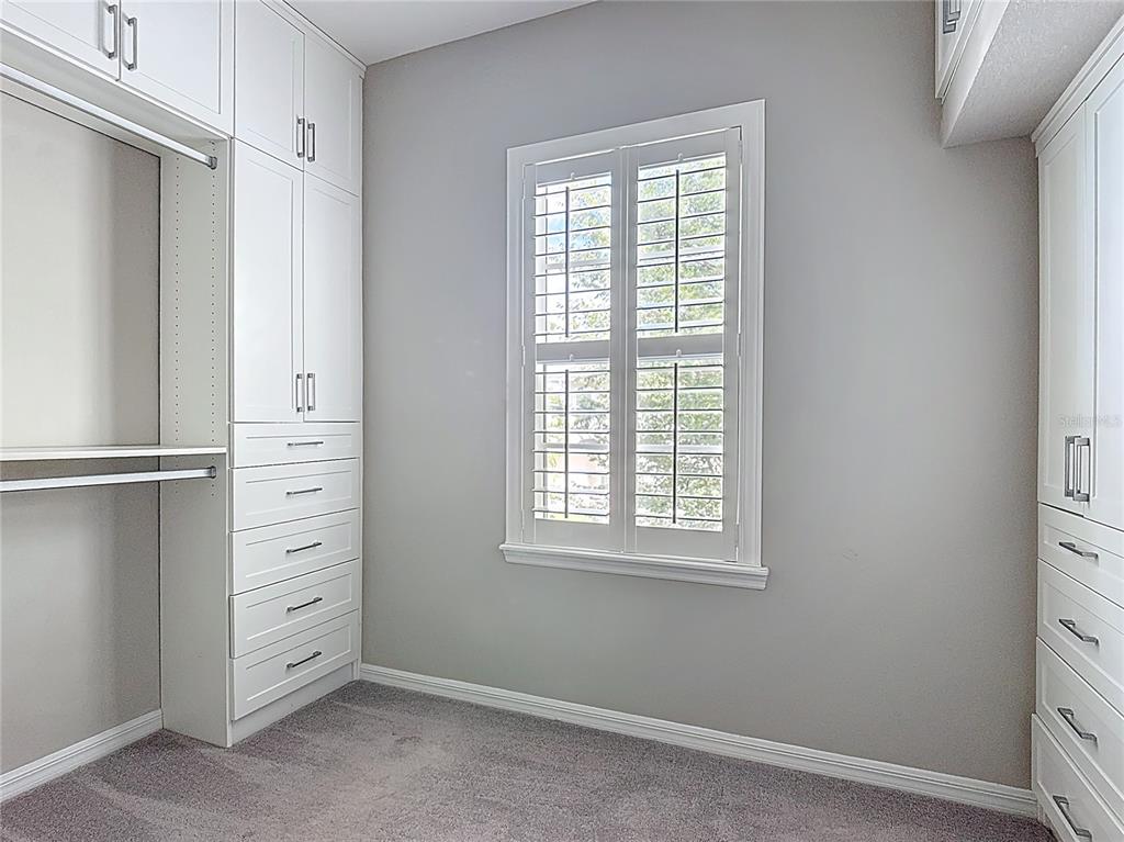 1513 Resolute Street Celebration, FL 34747 - Photo 32 of 43 an empty room with windows and closet