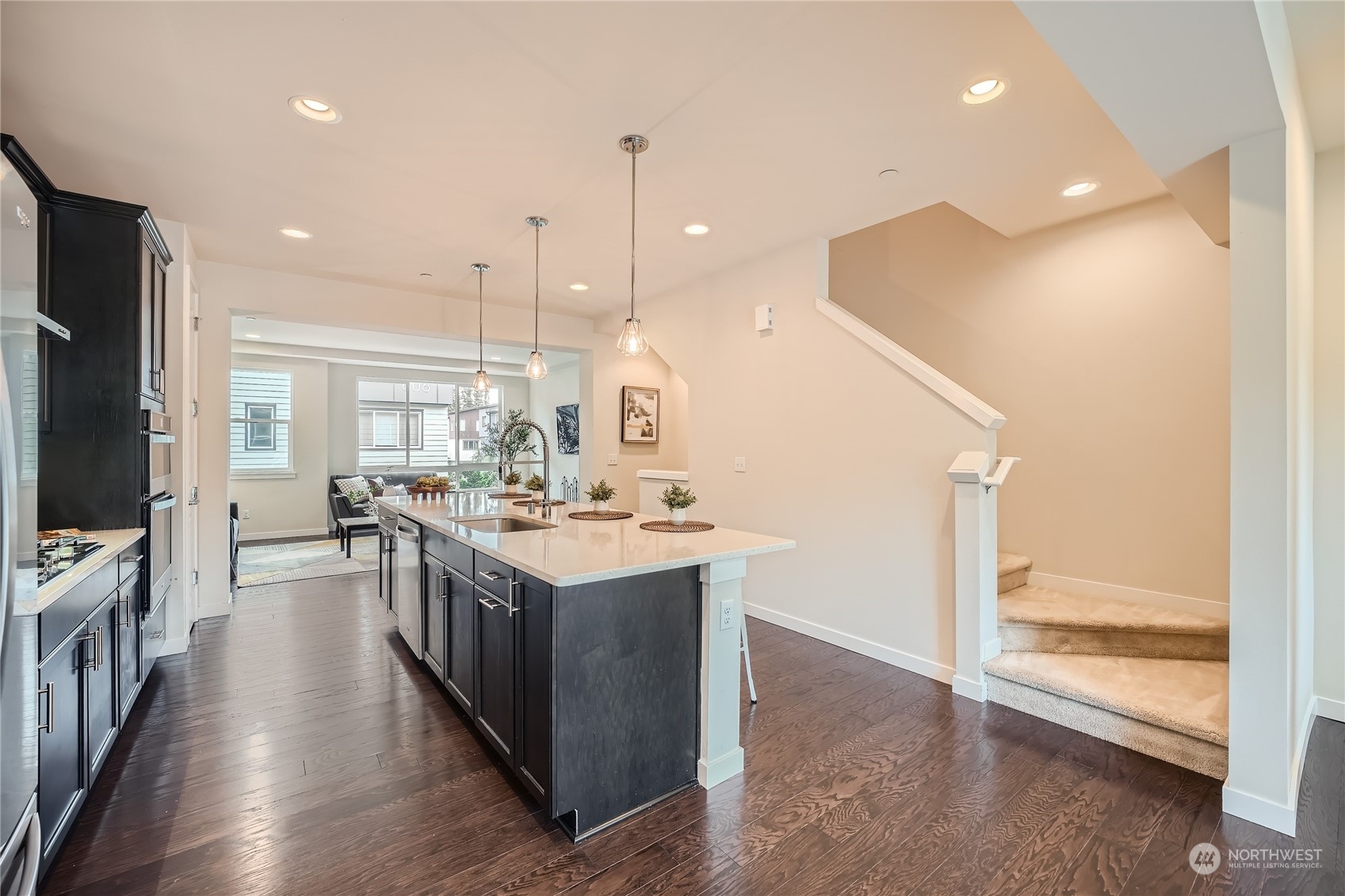 603 237th Street Southeast, Unit B Bothell, WA 98021 - Photo 11 of 27 a kitchen with a sink and wooden floor