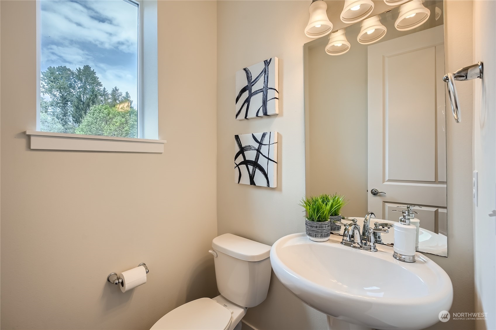603 237th Street Southeast, Unit B Bothell, WA 98021 - Photo 12 of 27 a bathroom with a toilet a sink and mirror