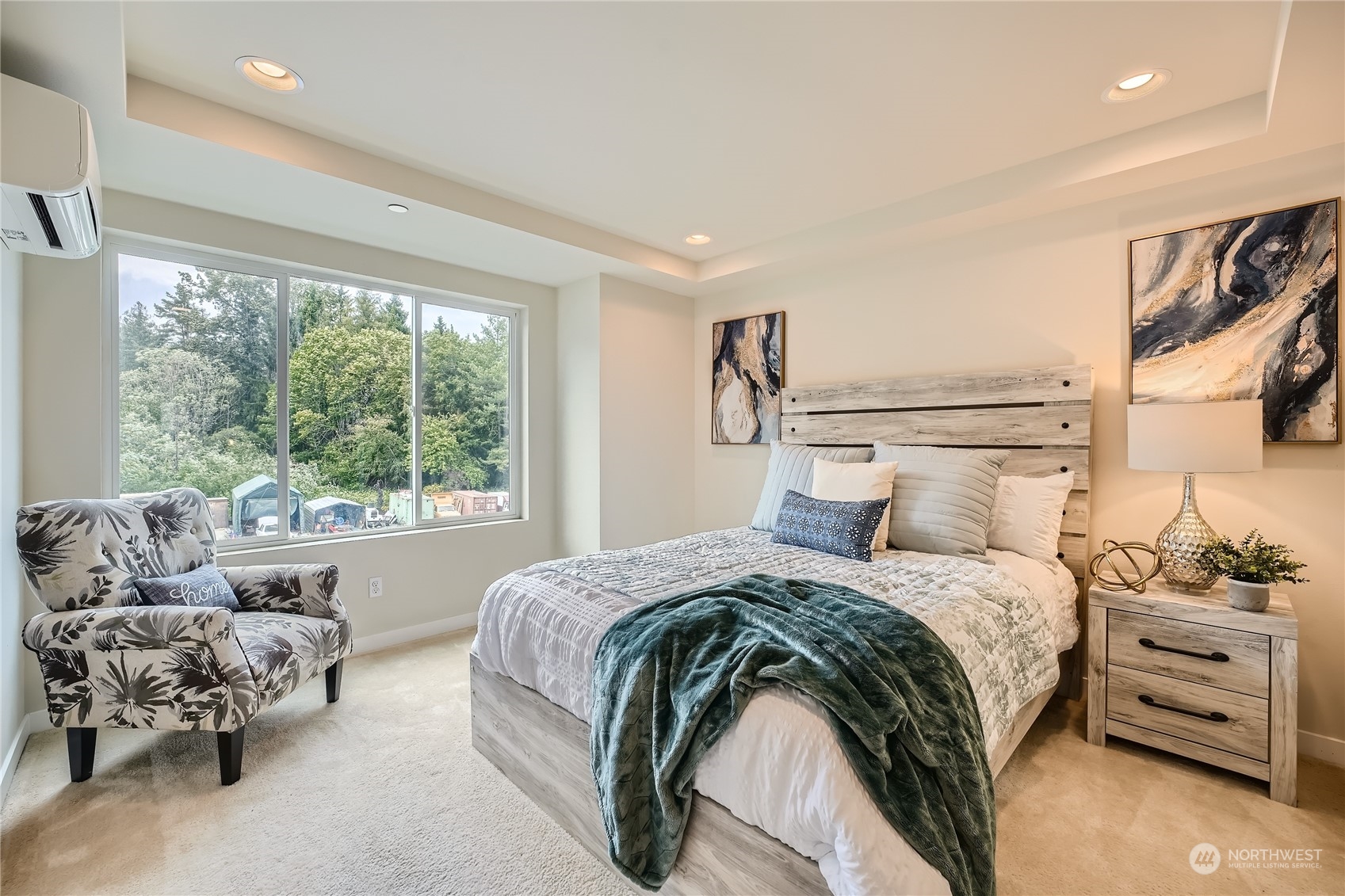 603 237th Street Southeast, Unit B Bothell, WA 98021 - Photo 13 of 27 a bedroom with a bed and a couch