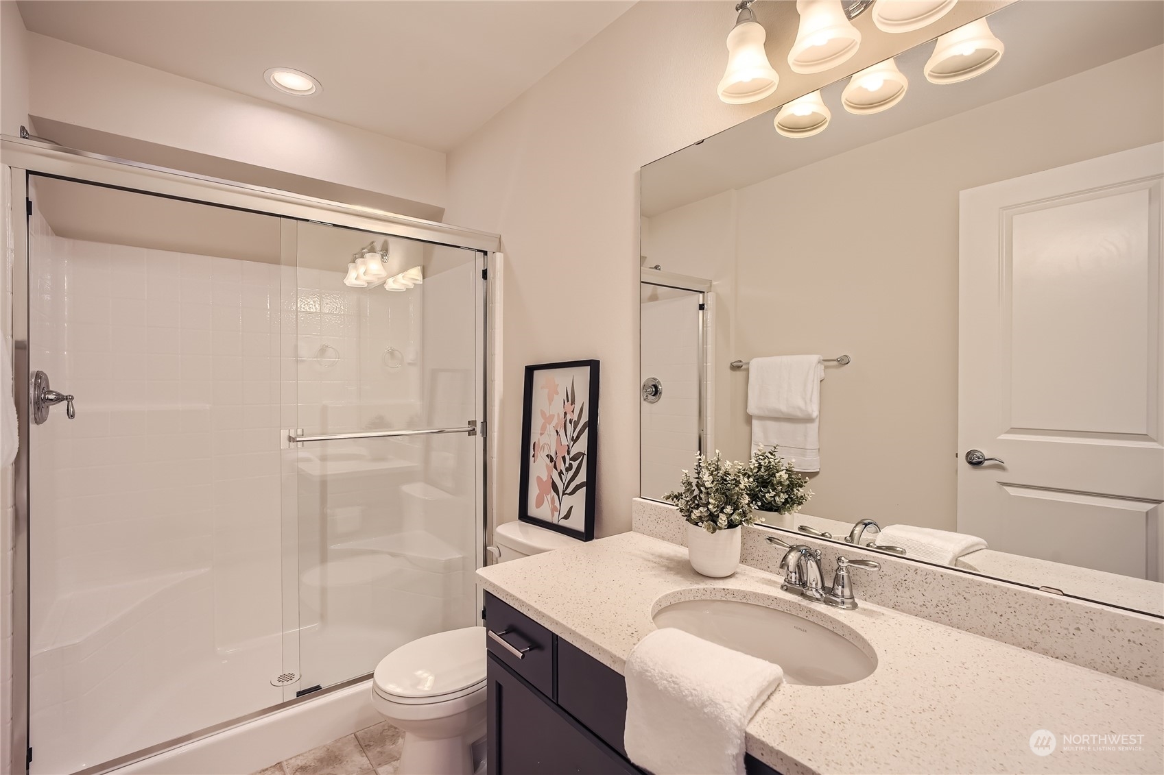 603 237th Street Southeast, Unit B Bothell, WA 98021 - Photo 23 of 27 a bathroom with a sink a toilet and shower