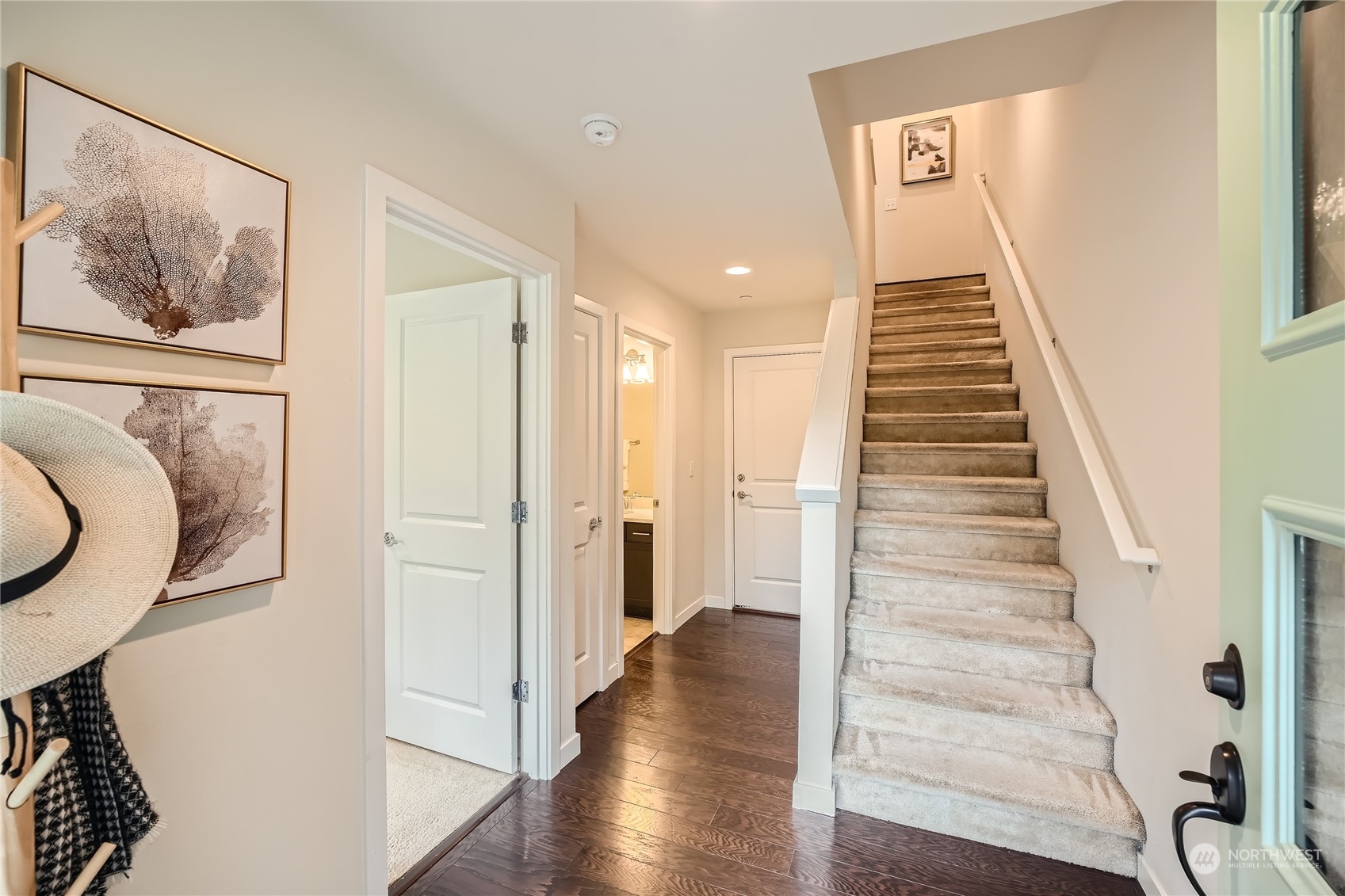 603 237th Street Southeast, Unit B Bothell, WA 98021 - Photo 24 of 27 a view of a hallway with wooden floor and entryway