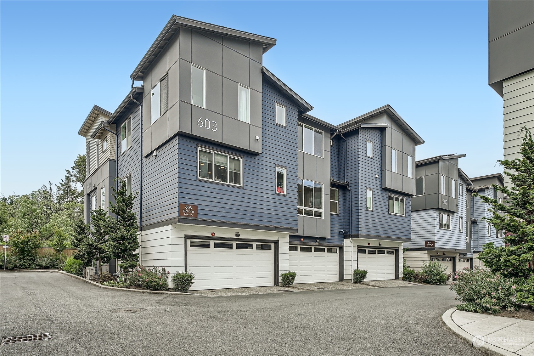 603 237th Street Southeast, Unit B Bothell, WA 98021 - Photo 27 of 27 a view of a house with a street
