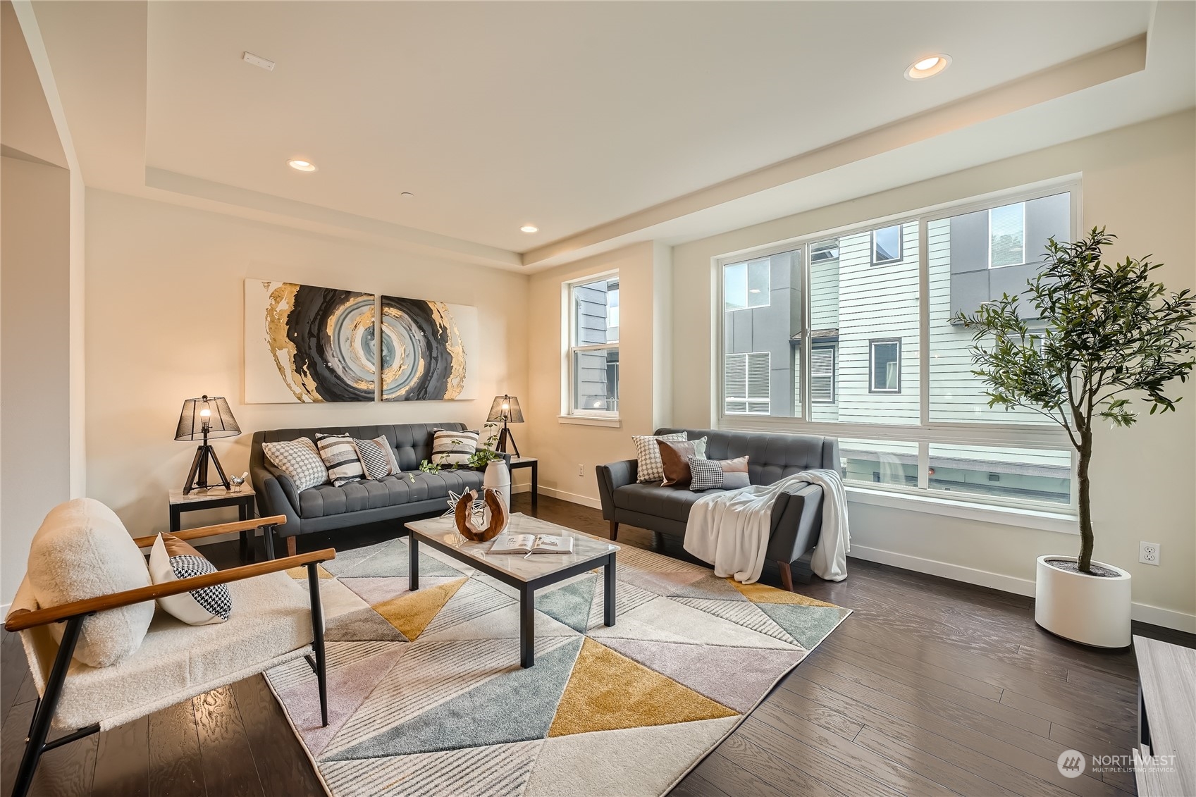 603 237th Street Southeast, Unit B Bothell, WA 98021 - Photo 3 of 27 a living room with furniture and a large window