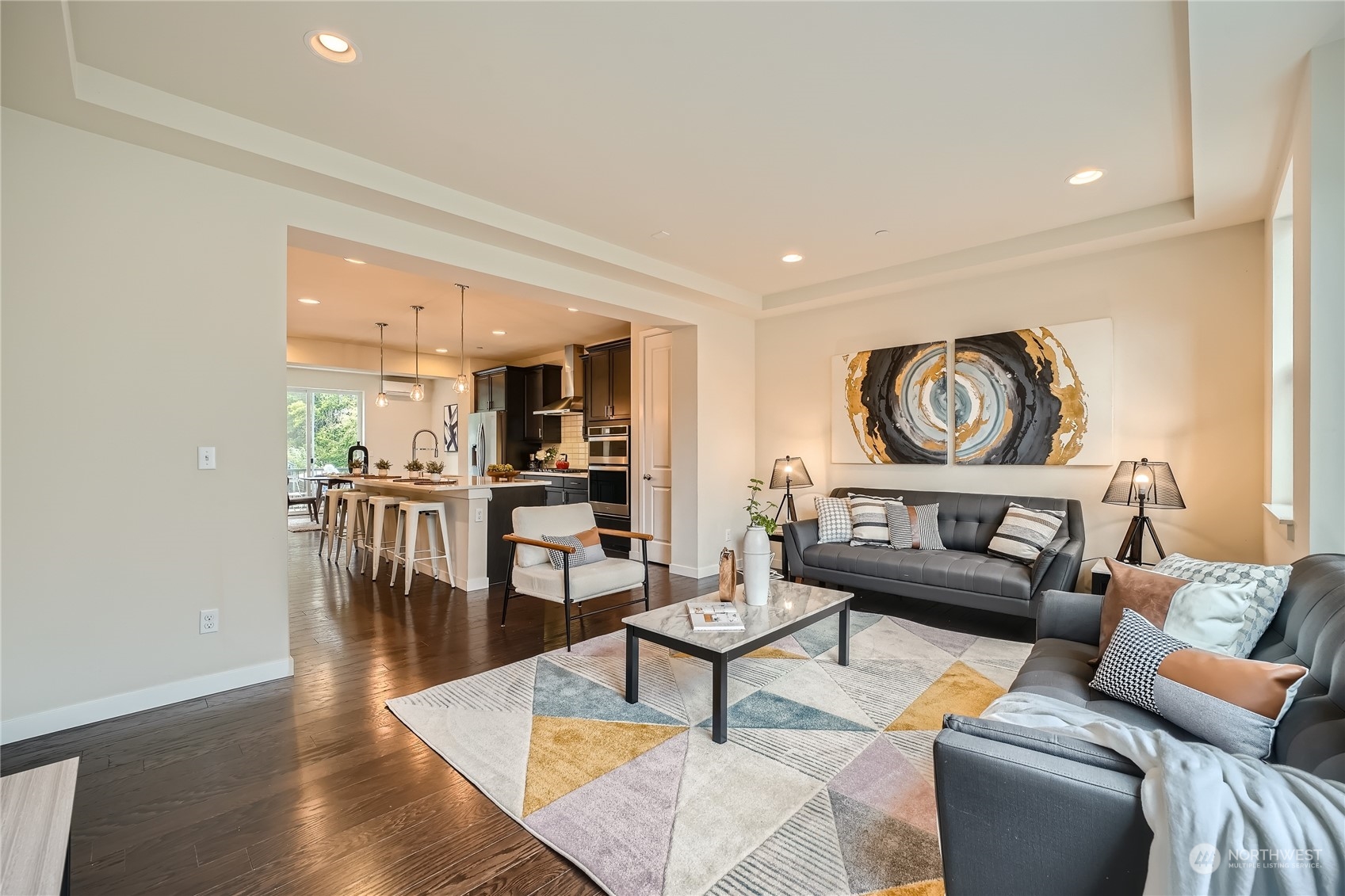 603 237th Street Southeast, Unit B Bothell, WA 98021 - Photo 4 of 27 a living room with furniture and a wooden floor