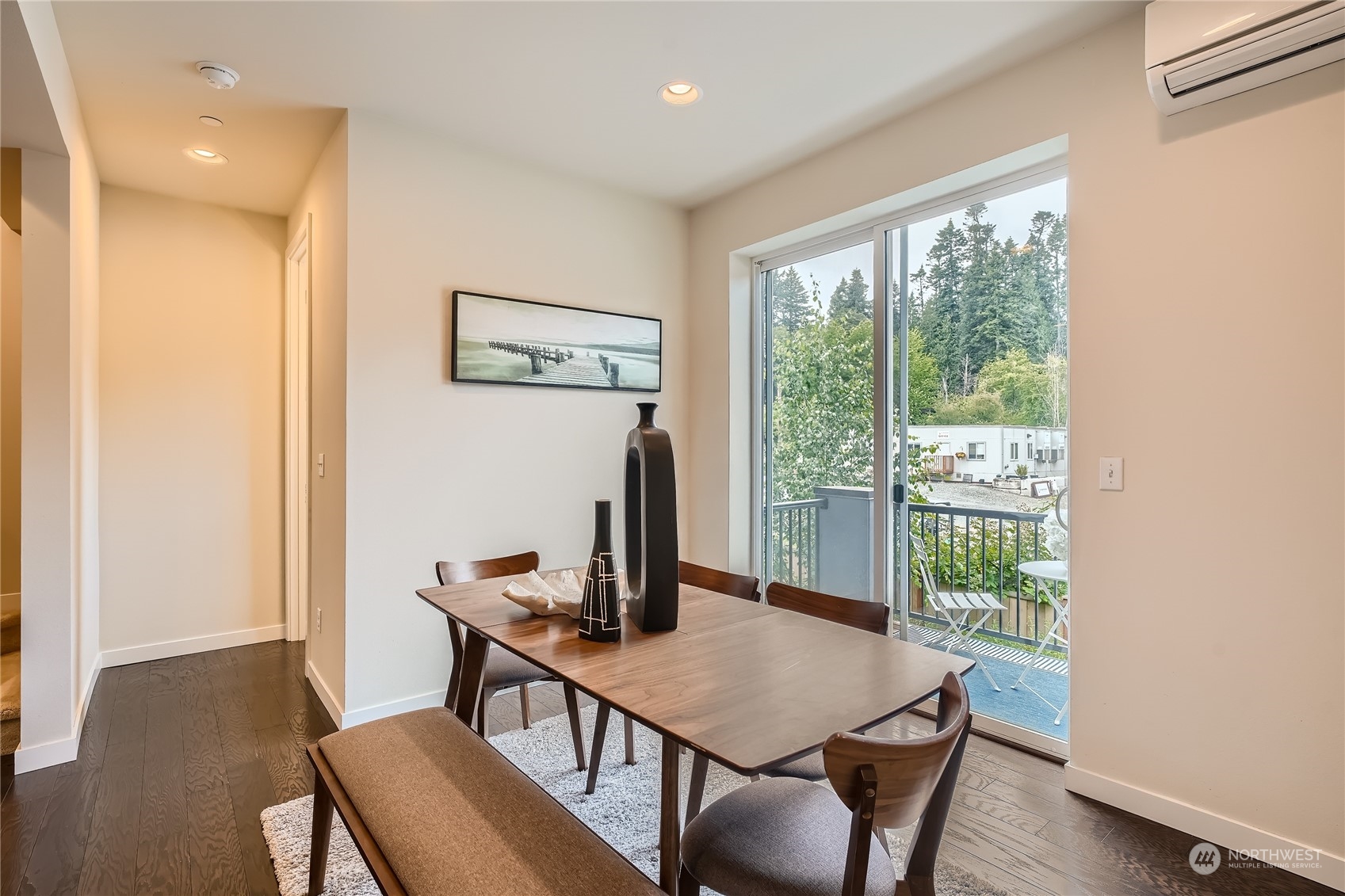 603 237th Street Southeast, Unit B Bothell, WA 98021 - Photo 6 of 27 a view of a dining room with furniture window and wooden floor