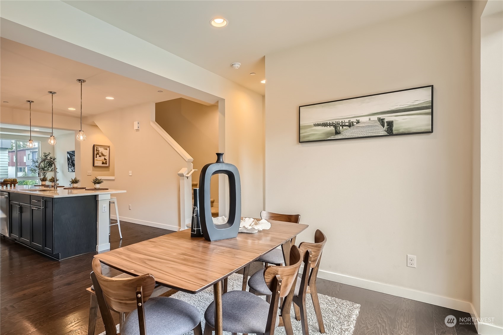 603 237th Street Southeast, Unit B Bothell, WA 98021 - Photo 7 of 27 a view of a dining room with furniture and wooden floor