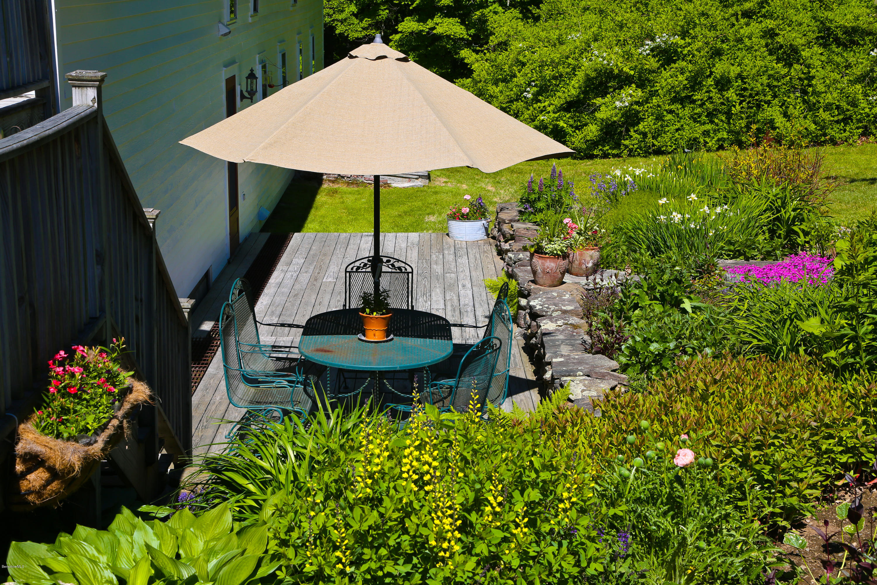 137 Leshure Road Rowe, MA 01367 - Photo 7 of 56 a view of a backyard with sitting area