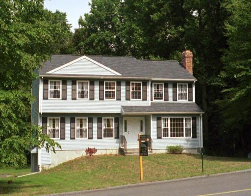 12 Red Barn Road Oxford, CT 06478 - Photo 1 of 1 a front view of a residential apartment building with a yard