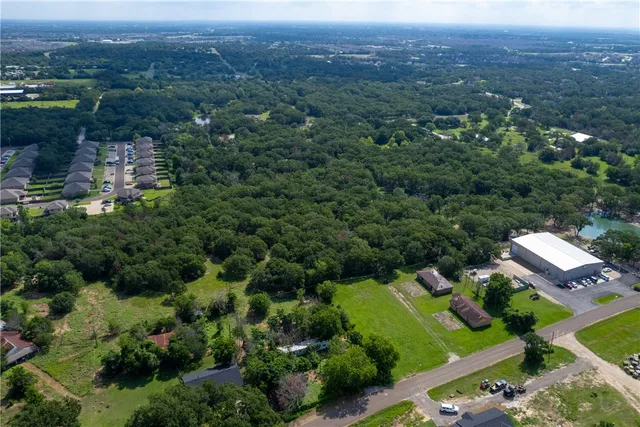 an aerial view of a city with lots of residential buildings