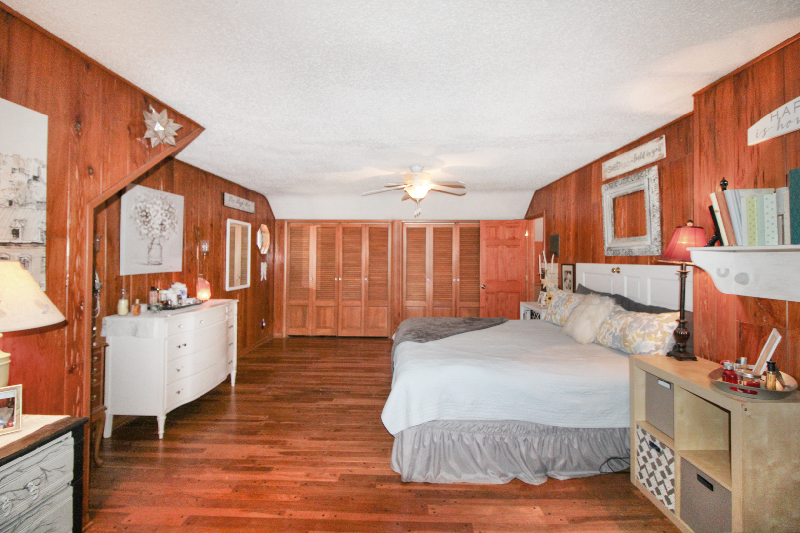 9033 Crego Road Waterman, IL 60556 - Photo 11 of 21 a spacious bedroom with a bed and a dresser