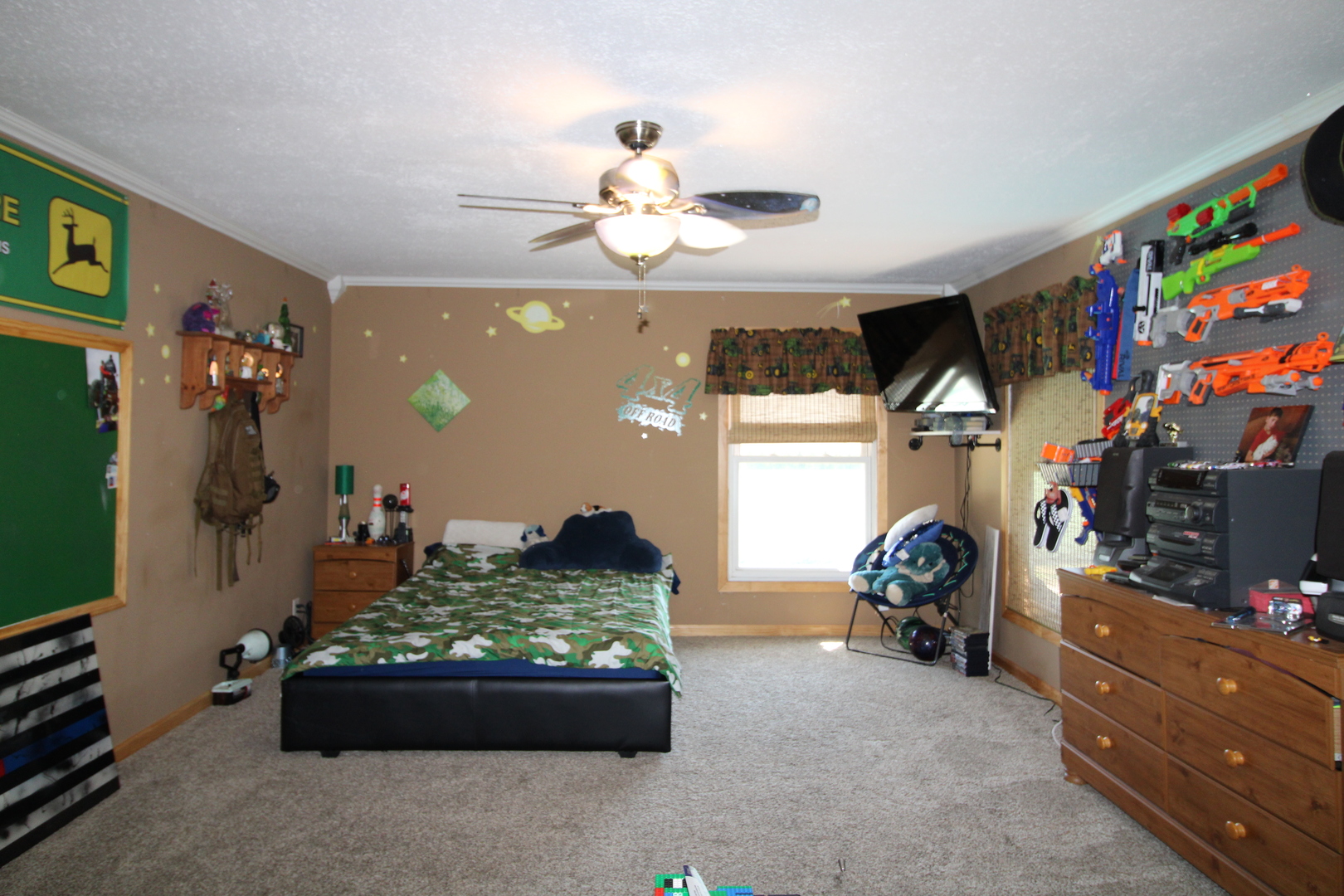 9033 Crego Road Waterman, IL 60556 - Photo 14 of 21 a living room with furniture and a flat screen tv