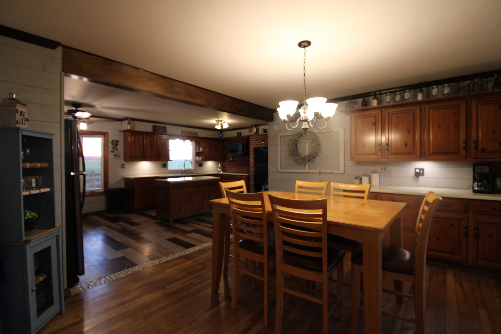 9033 Crego Road Waterman, IL 60556 - Photo 6 of 21 a kitchen with a table and chairs in it