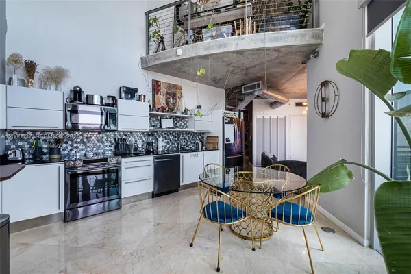 a living room filled with furniture