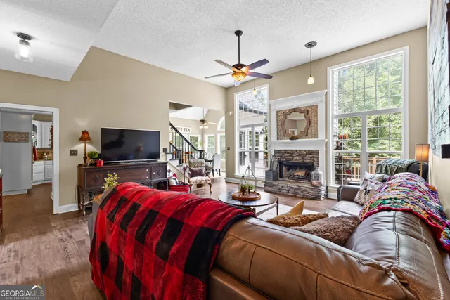 a bathroom with a sink and a large window