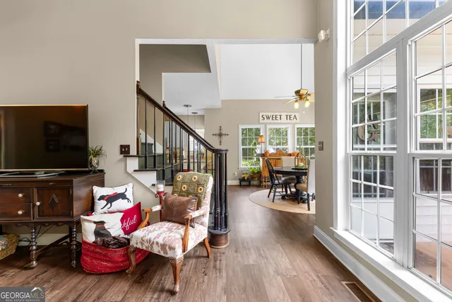 a spacious en suite bathroom with double vanity and a mirror