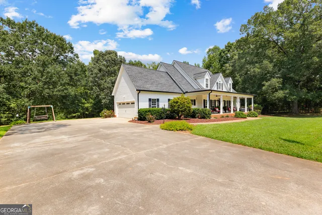 a view of a house with a swimming pool