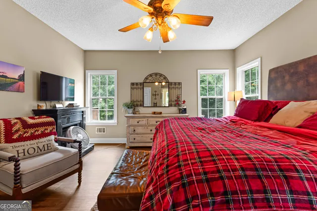 a view of a room with wooden walls and stairs