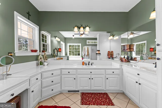 an aerial view of a houses with a yard