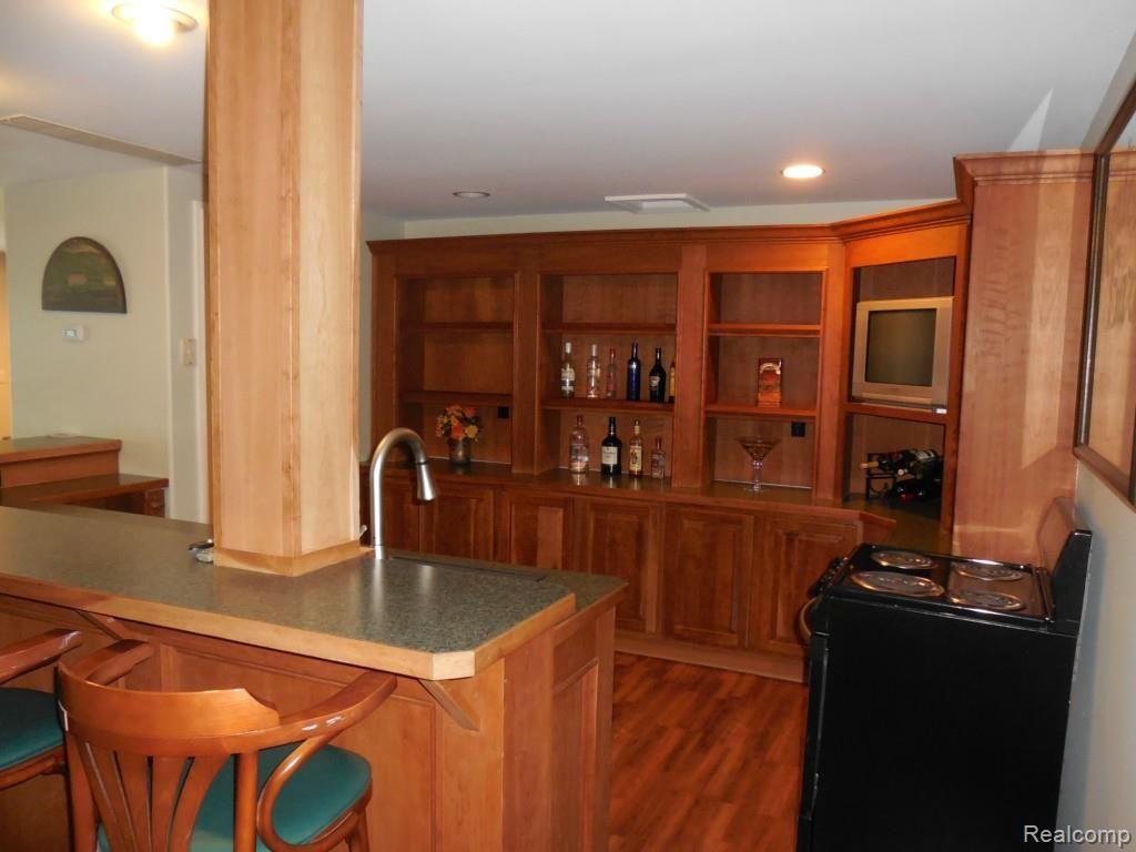 9939 North Eston Road Clarkston, MI 48348 - Photo 23 of 27 lower level bar.jpg