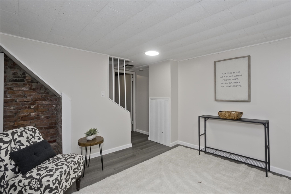 99 Massreco Street Springfield, MA 01109 - Photo 19 of 40 a living room with furniture