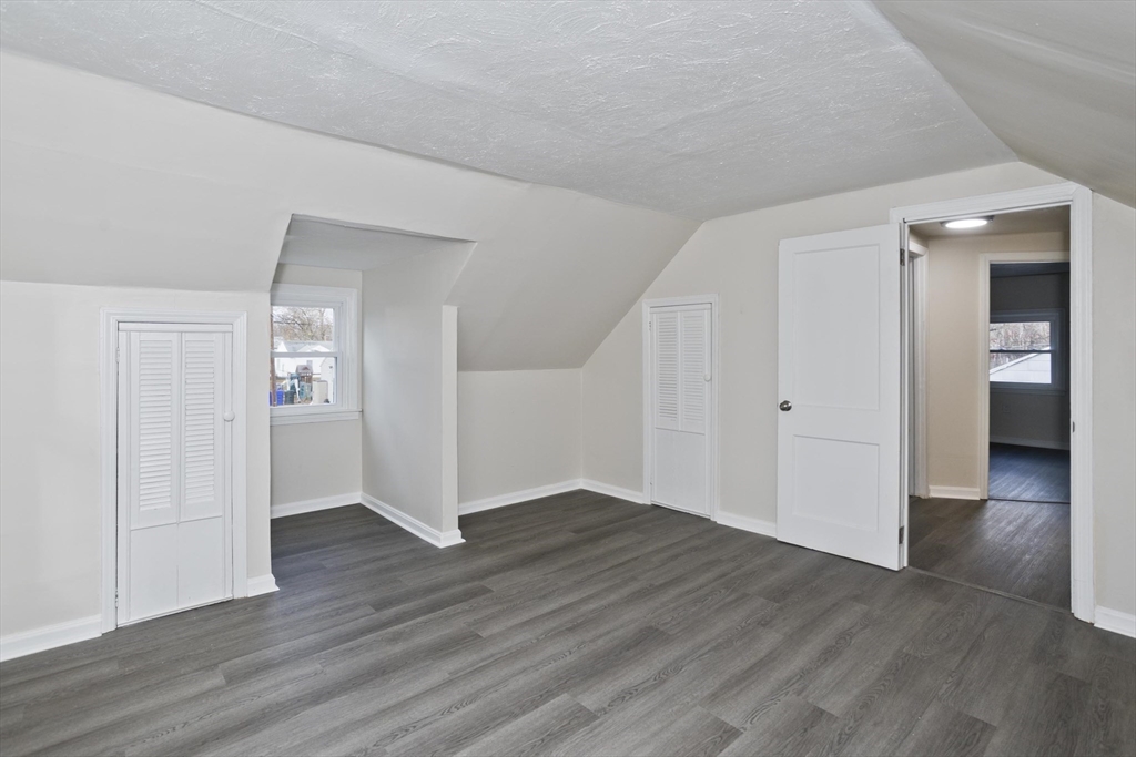 99 Massreco Street Springfield, MA 01109 - Photo 21 of 40 a view of empty room with wooden floor