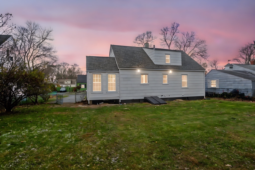 99 Massreco Street Springfield, MA 01109 - Photo 33 of 40 a front view of a house with a garden