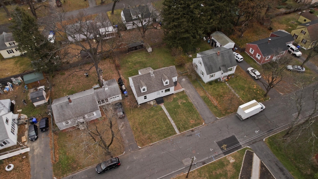 99 Massreco Street Springfield, MA 01109 - Photo 36 of 40 an aerial view of a house with a lake view