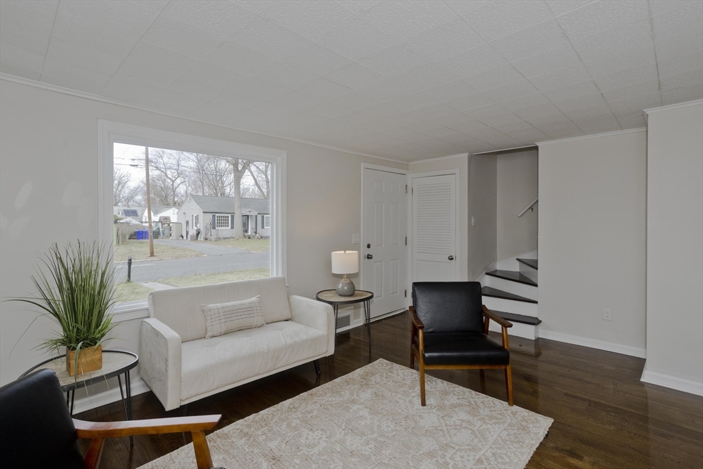 99 Massreco Street Springfield, MA 01109 - Photo 5 of 40 a living room with furniture and wooden floor