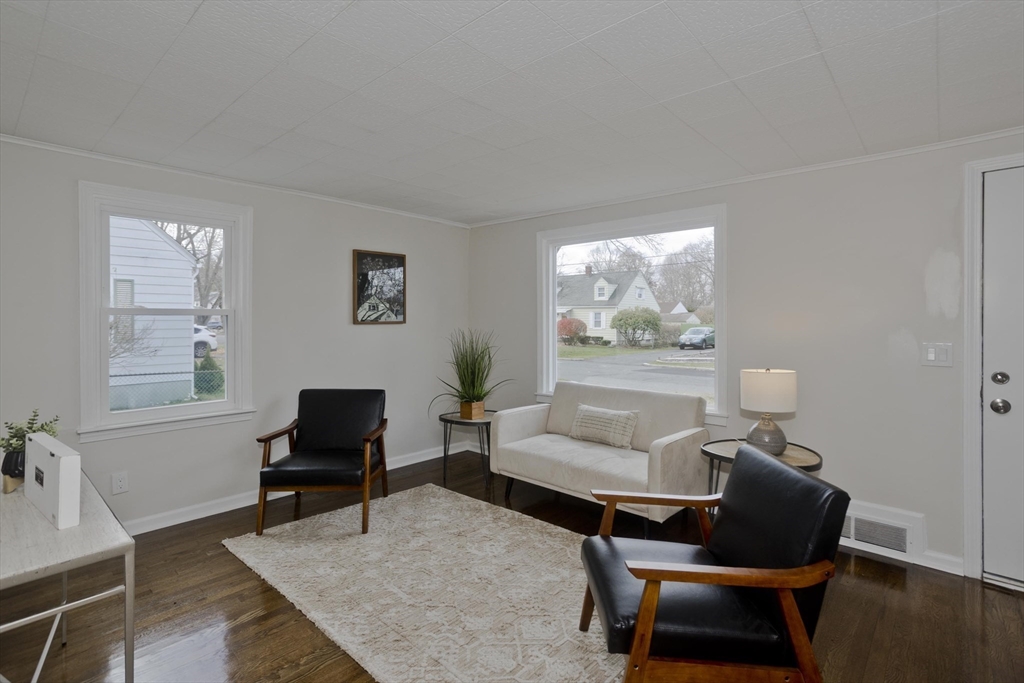 99 Massreco Street Springfield, MA 01109 - Photo 6 of 40 a living room with furniture and a window