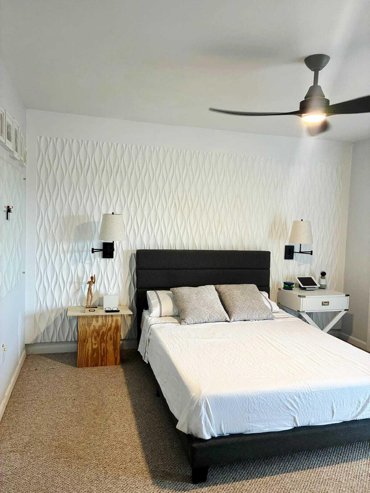 4863 Via Palm Lakes, Unit 812 West Palm Beach, FL 33417 - Photo 14 of 27 a bedroom with a bed and window