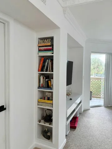 a room with furniture and window