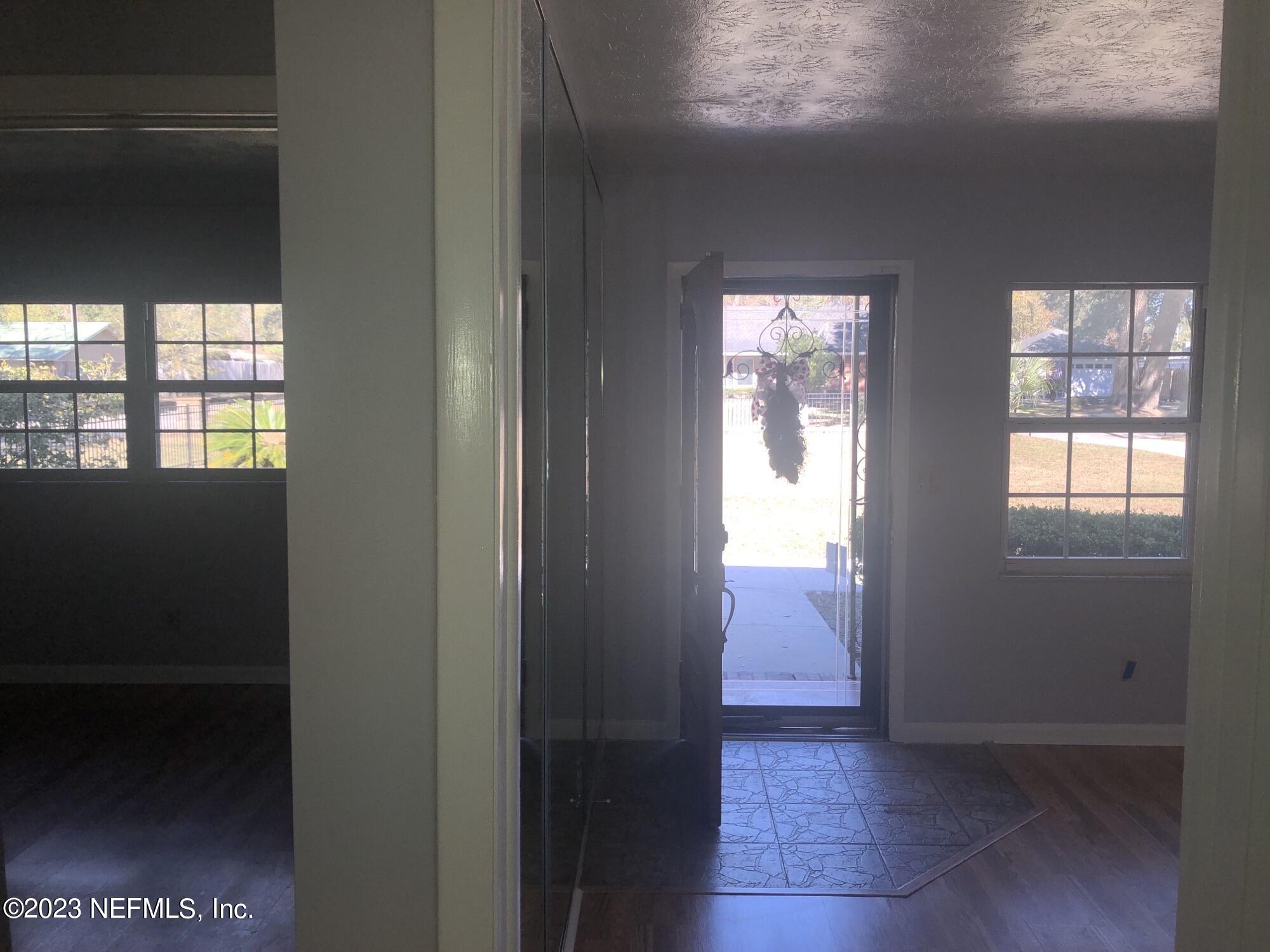 326 Blake Avenue Orange Park, FL 32073 - Photo 11 of 25 a view of hallway with windows