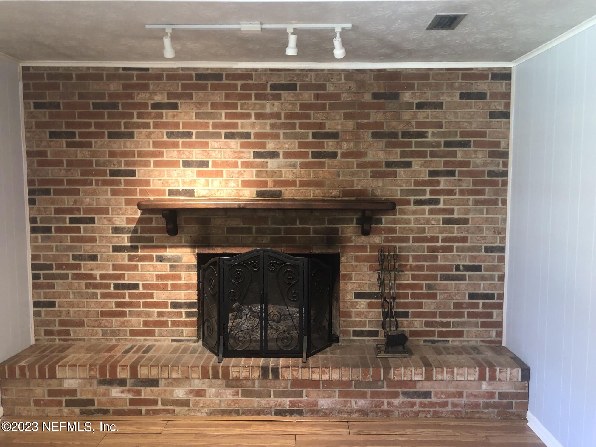 326 Blake Avenue Orange Park, FL 32073 - Photo 12 of 25 a room with a fireplace