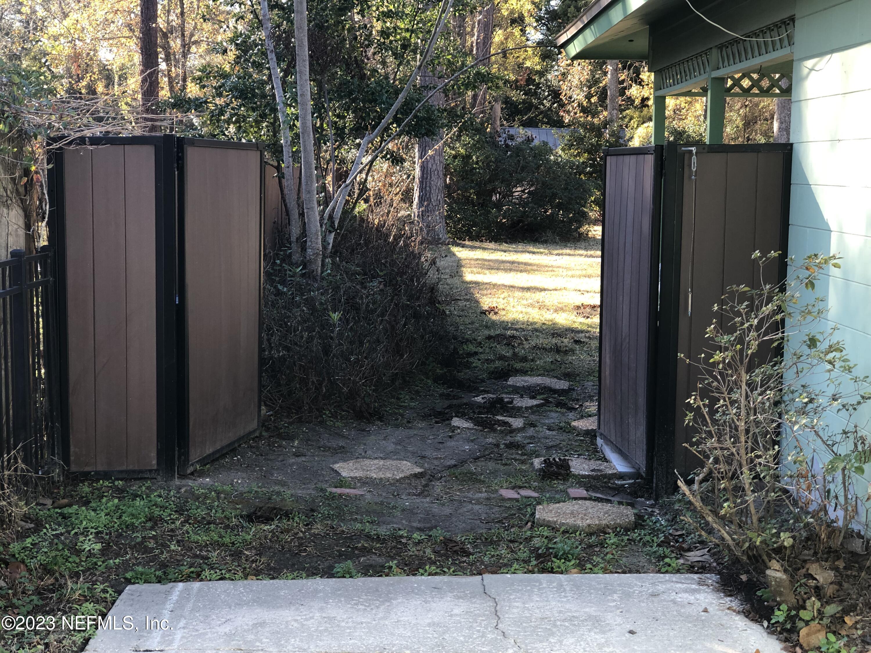 326 Blake Avenue Orange Park, FL 32073 - Photo 17 of 25 a view of a house with backyard and garden