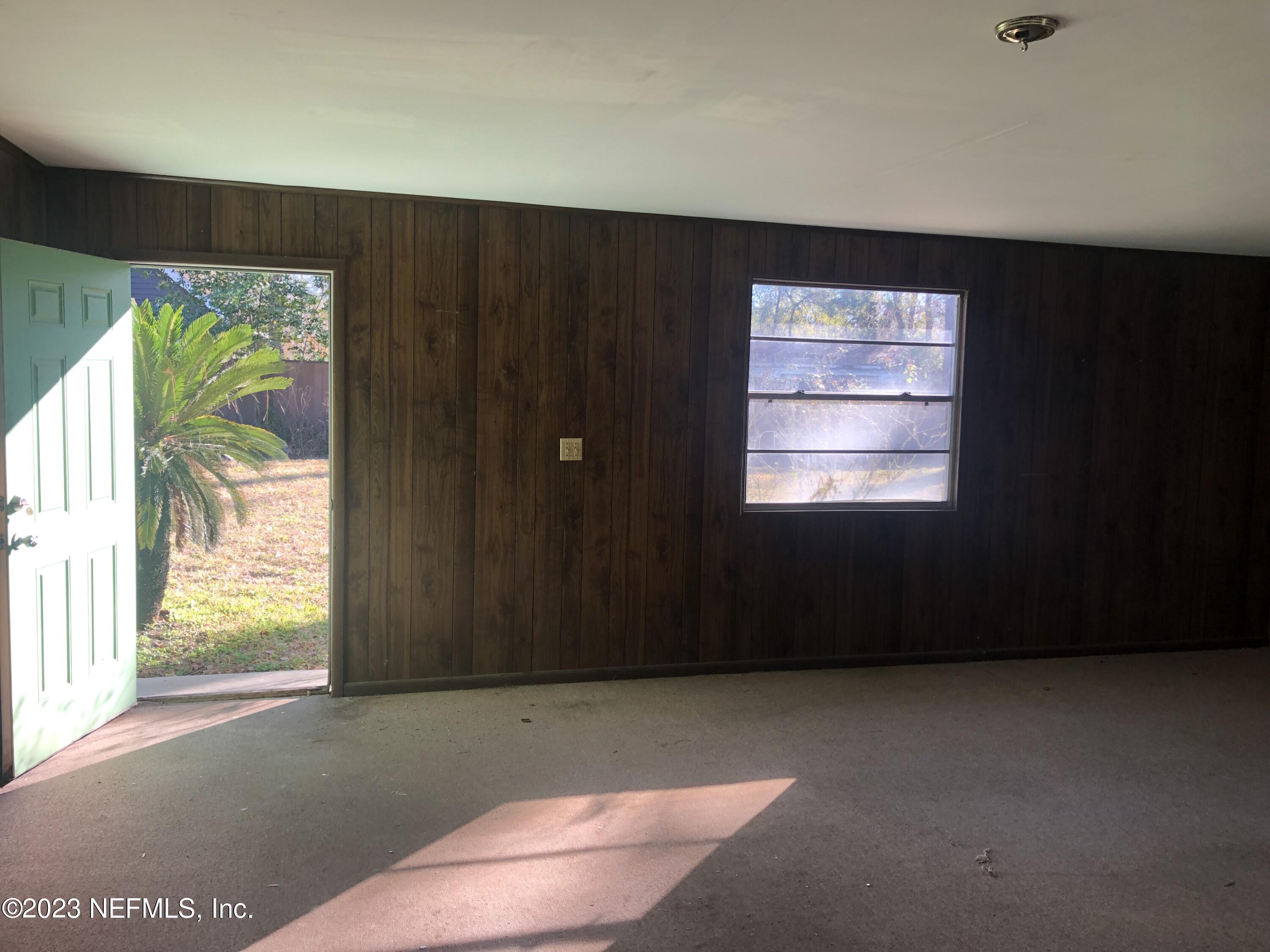326 Blake Avenue Orange Park, FL 32073 - Photo 24 of 25 an empty room with windows