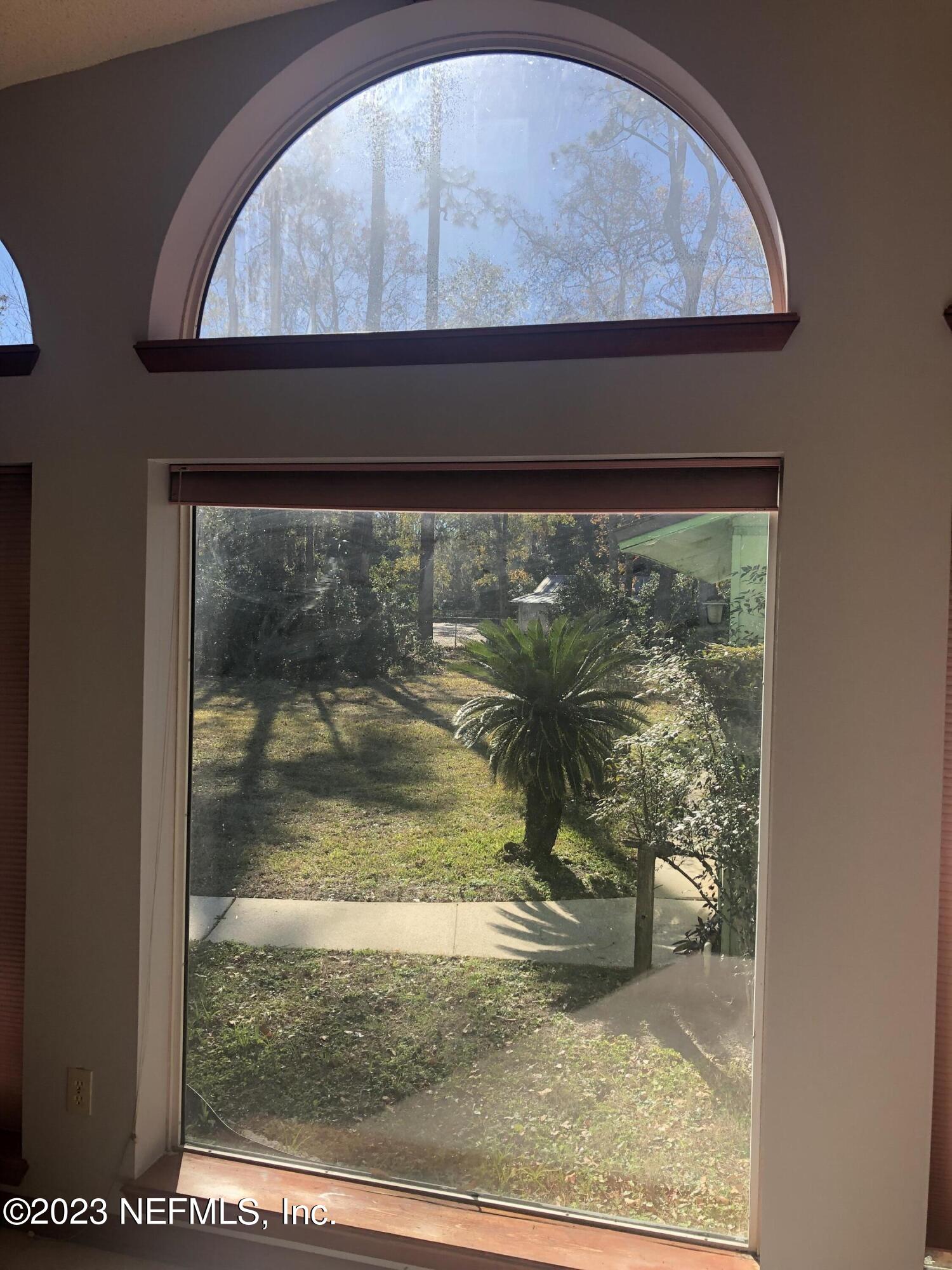 326 Blake Avenue Orange Park, FL 32073 - Photo 3 of 25 a view of a wooden door