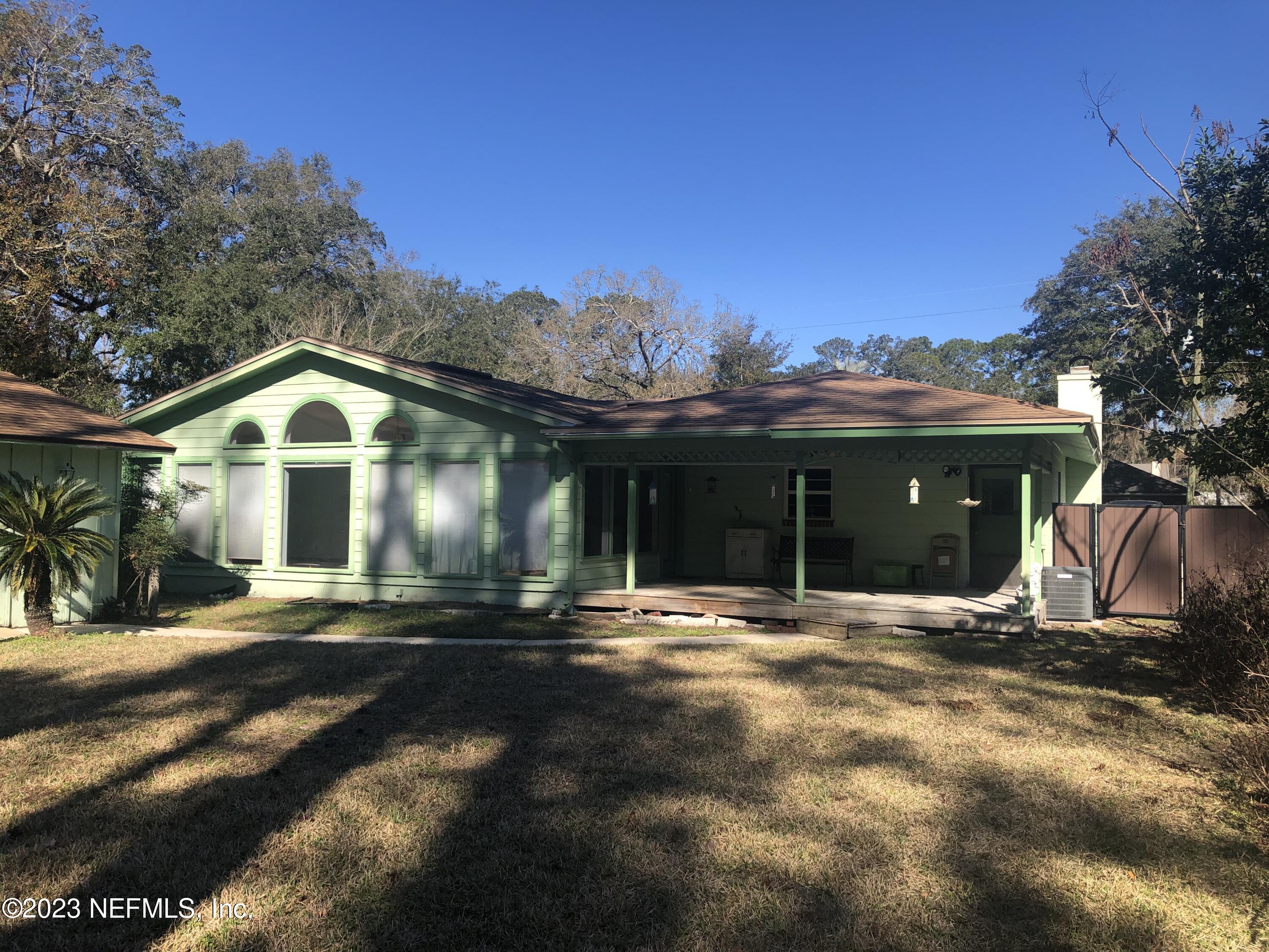 326 Blake Avenue Orange Park, FL 32073 - Photo 4 of 25 a front view of a house with a yard
